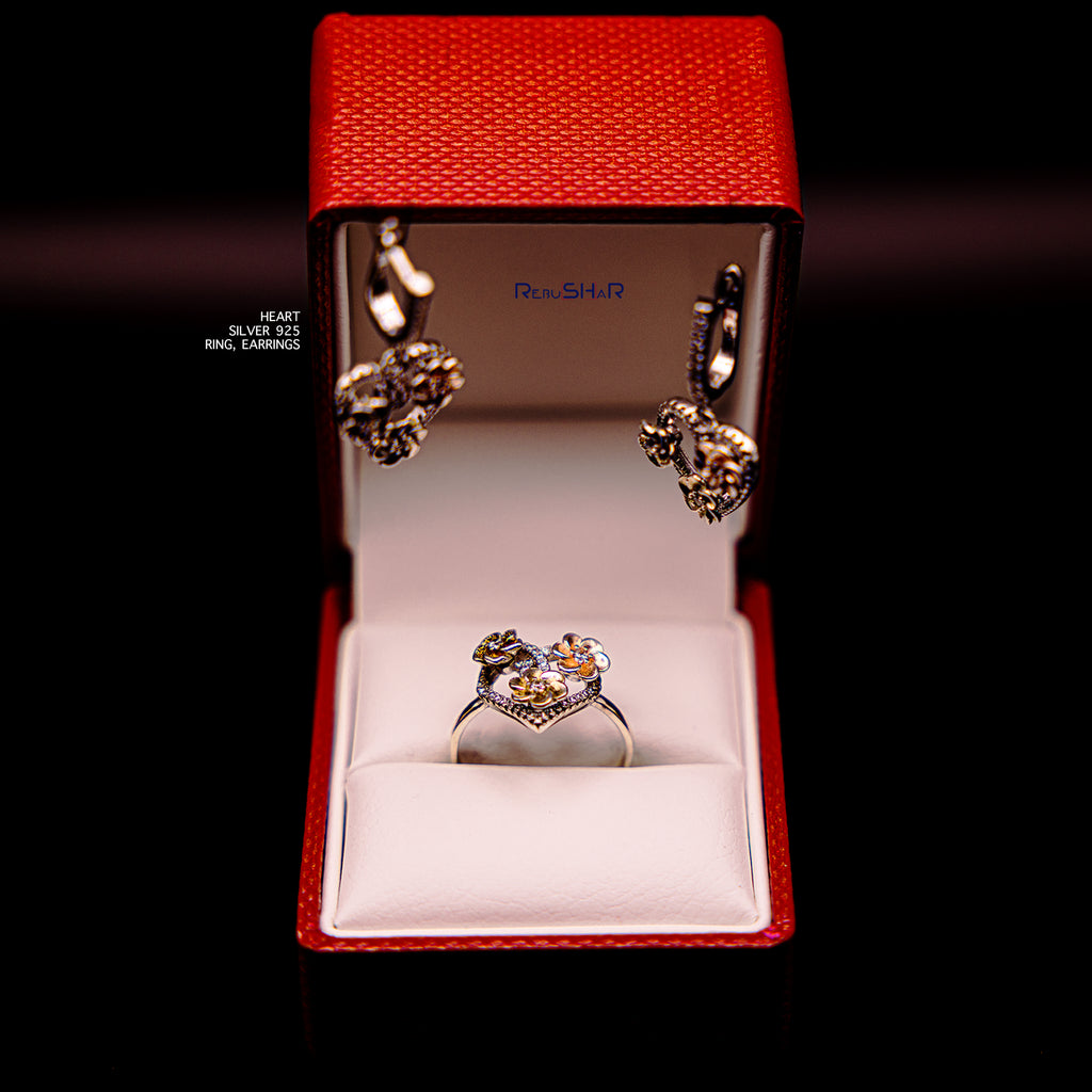 Conjunto de anillos y pendientes de corazón
