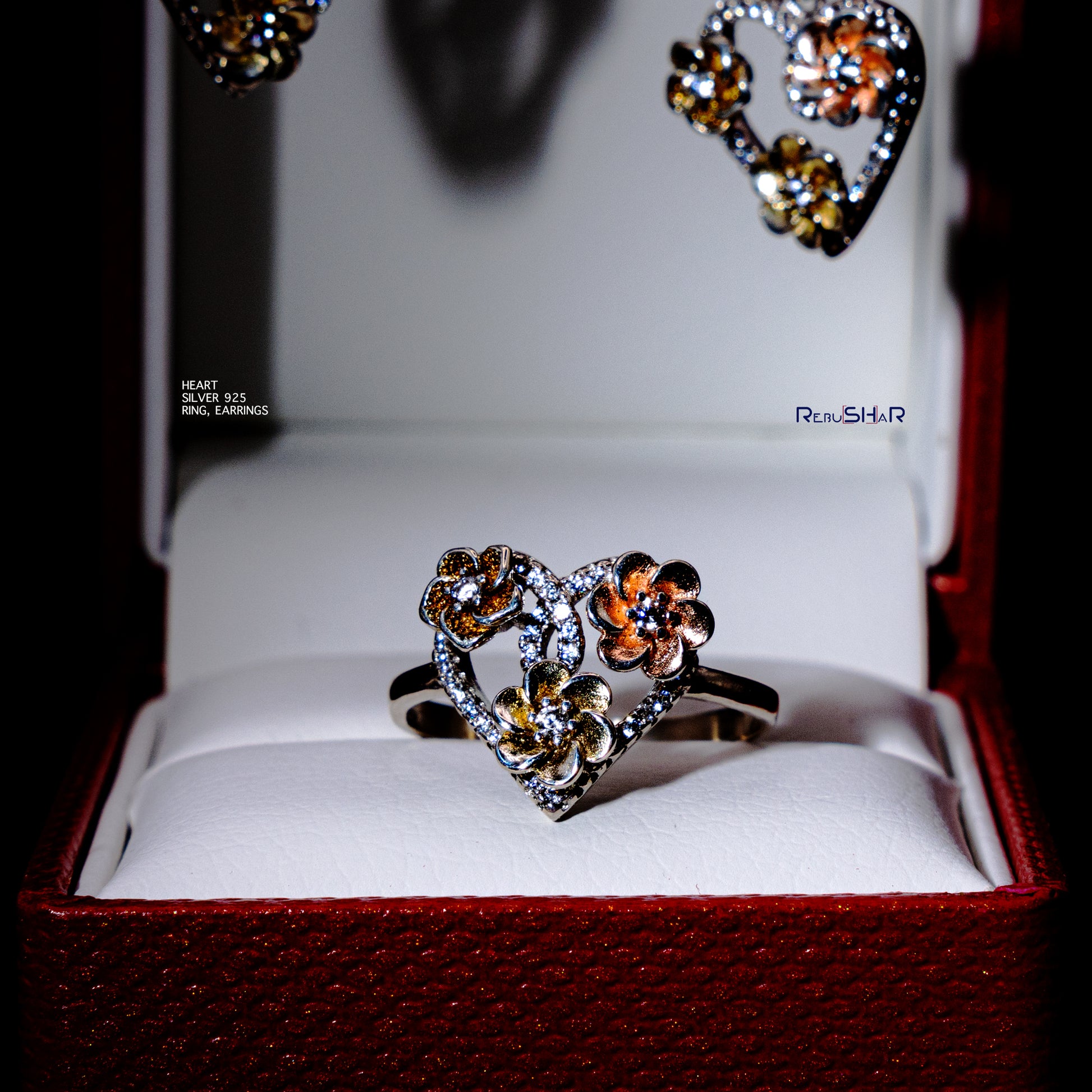 Conjunto de anillos y pendientes de corazón